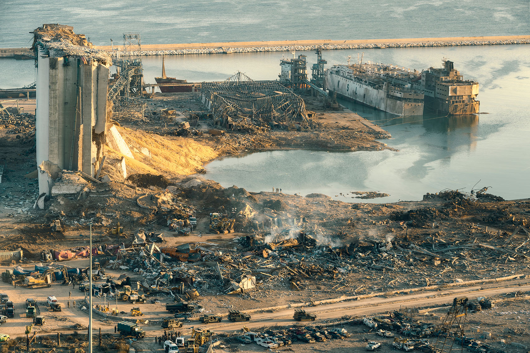 BEIRUT, LEBANON - AUGUST 05 2020: Aerial view of Beirut Port completely destroyed as the inspection of the scene continue after a fire at a warehouse with explosives  led to massive blasts in Beirut